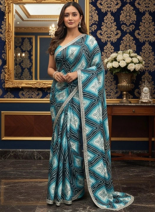 Woman in a blue patterned saree