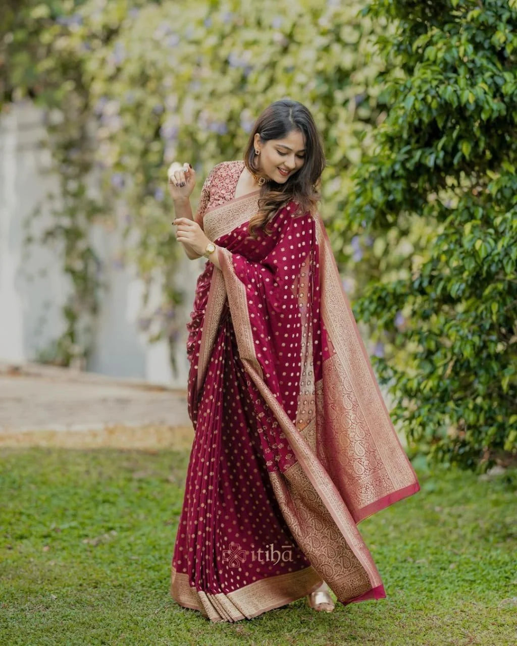 Fulari maroon Banarasi silk saree with golden zari work styled in an elegant festive look