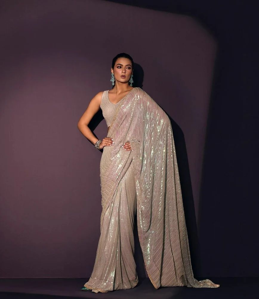 Glamorous beige sequin saree by Fulari designed for modern parties, receptions, and luxury celebrations