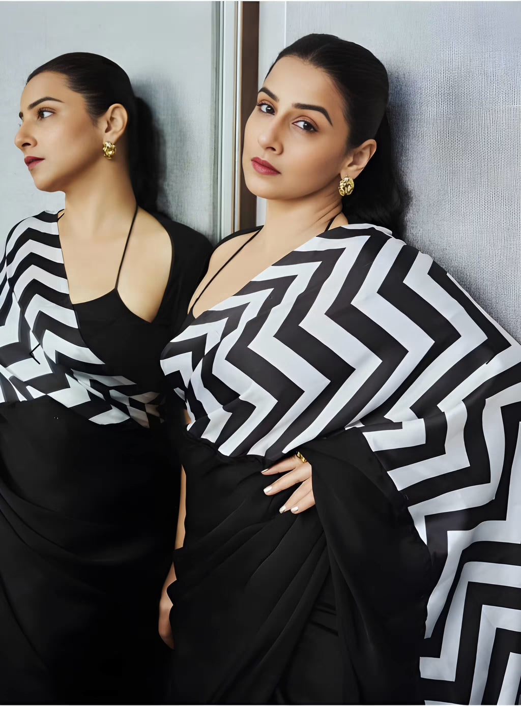 Designer black saree by Fulari featuring striking chevron pattern and contemporary drape for stylish occasions