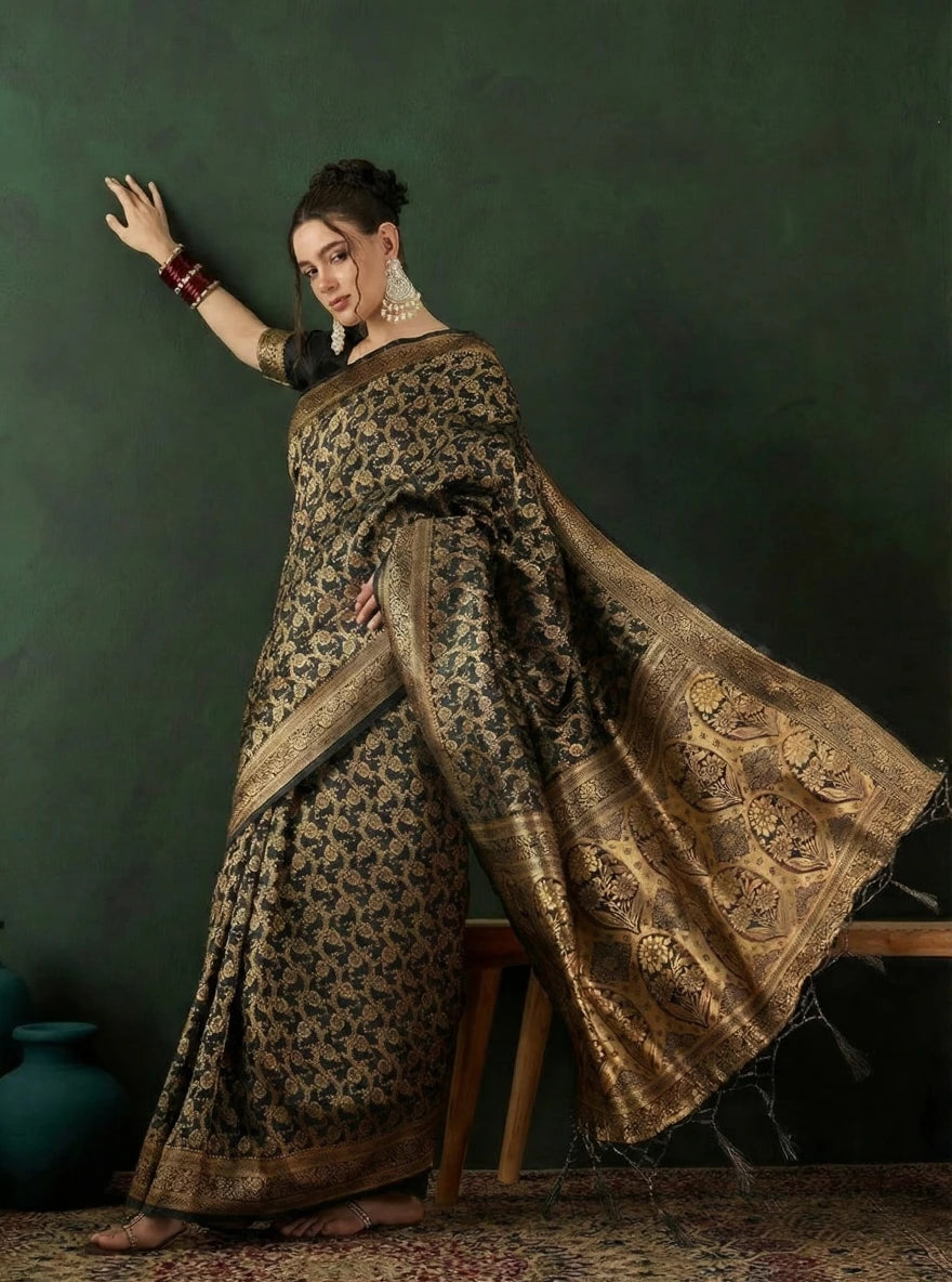 Heritage black and gold silk saree by Fulari featuring intricate traditional motifs and luxurious drape for bridal and festive wear
