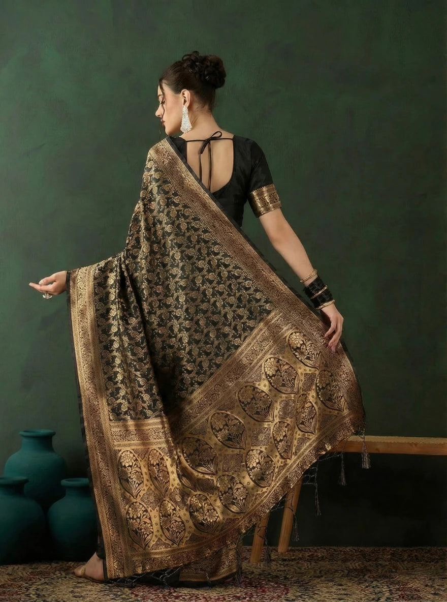 Premium black and gold wedding wear saree by Fulari showcasing intricate traditional weaving and an elegant statement drape