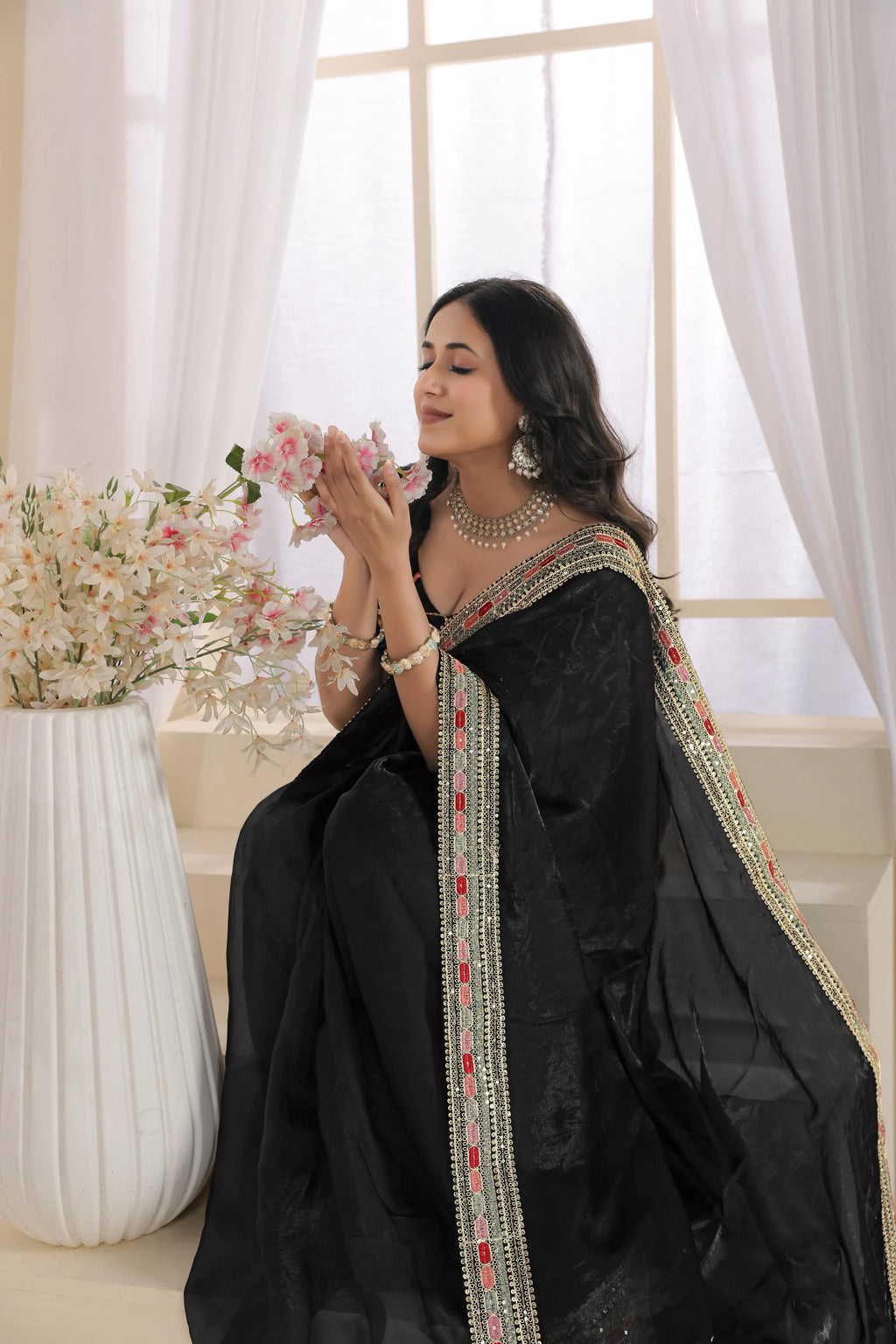Luxury Fulari black evening wear saree with ornate border accents, perfect for festive and formal events