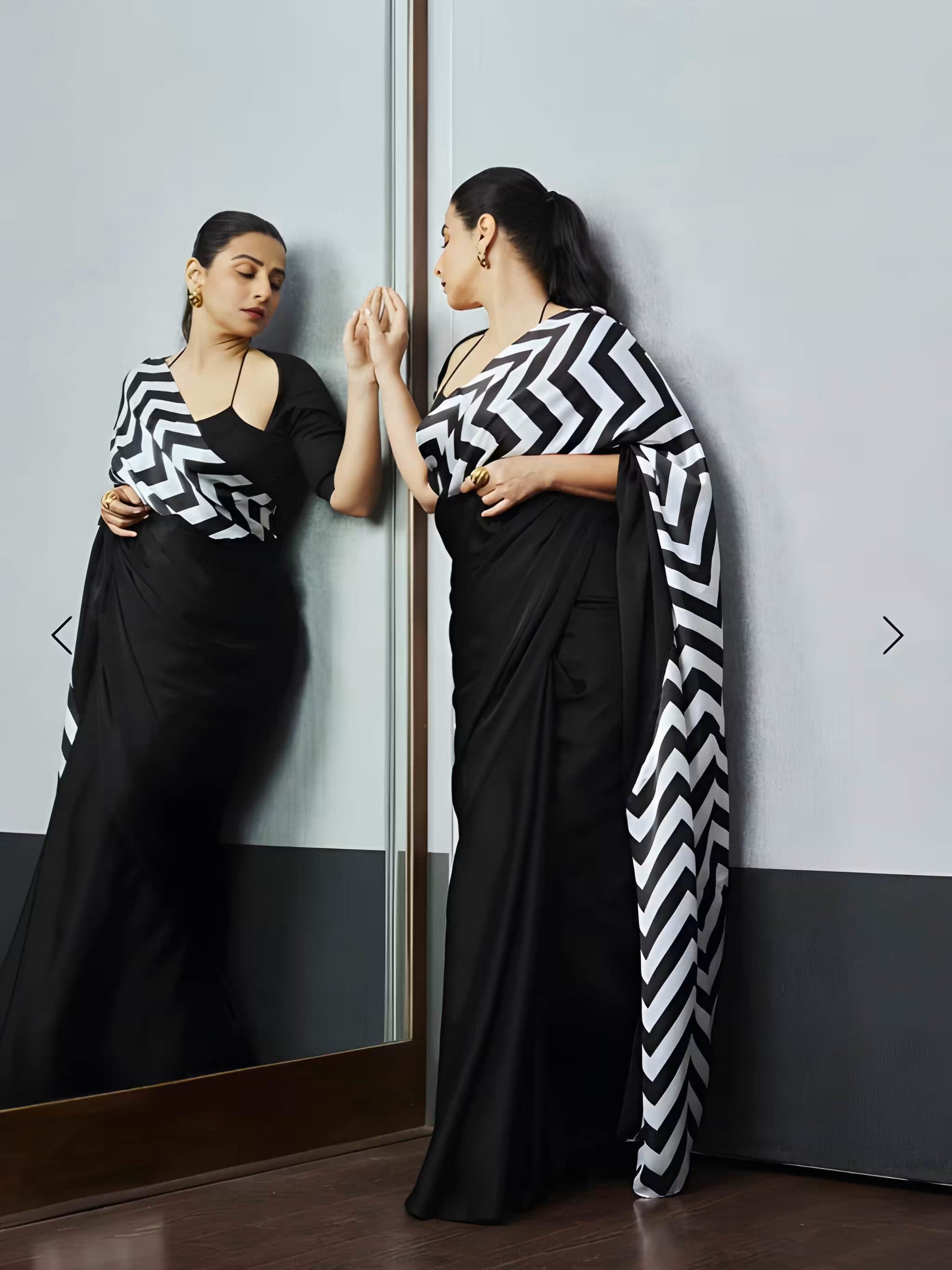 Modern Fulari black saree with bold chevron print, designed for fashion-forward party and evening styling