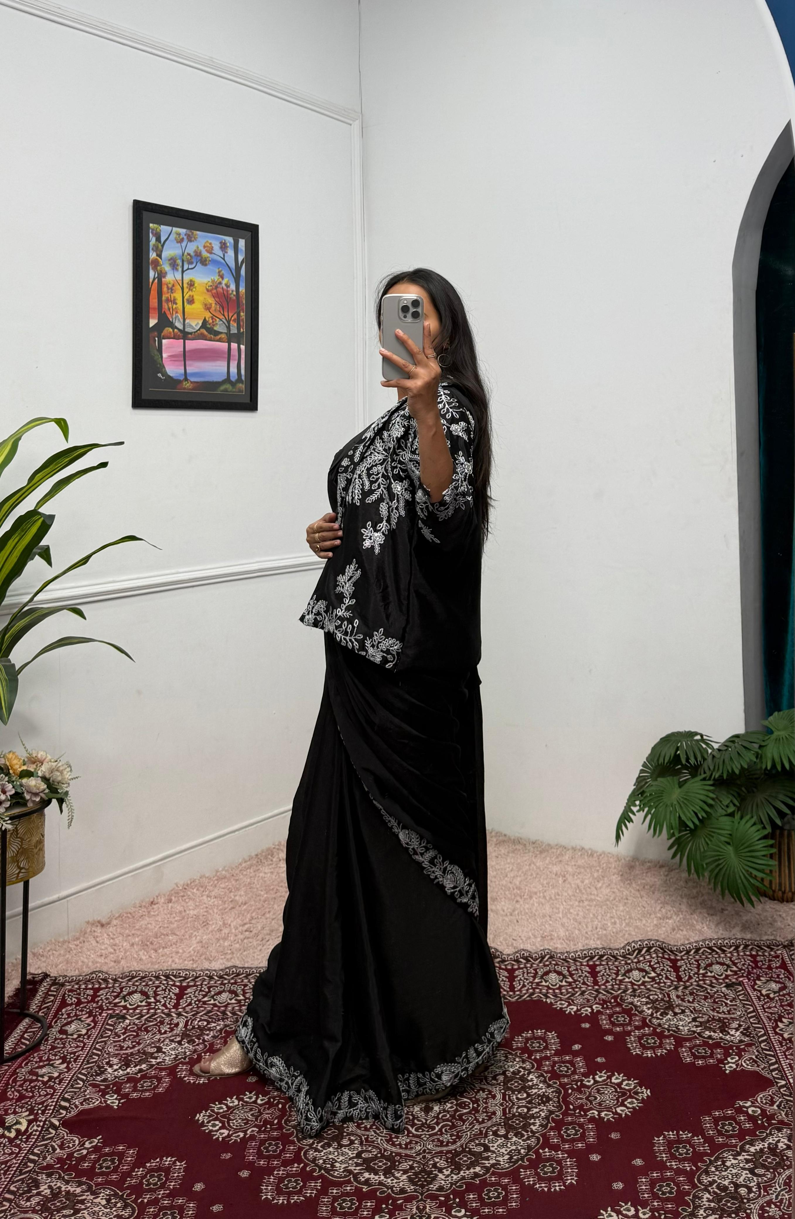 Fulari black party saree with a contemporary jacket style designed for festive occasions