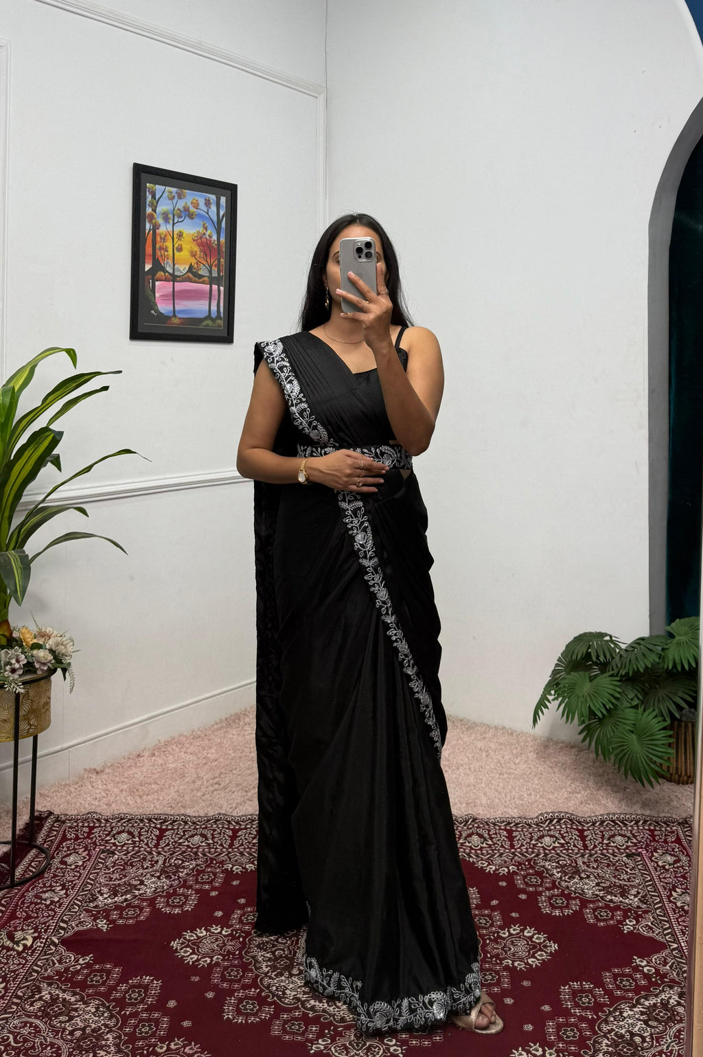 Fulari black party wear saree paired with a stylish jacket designed for a modern festive look for women