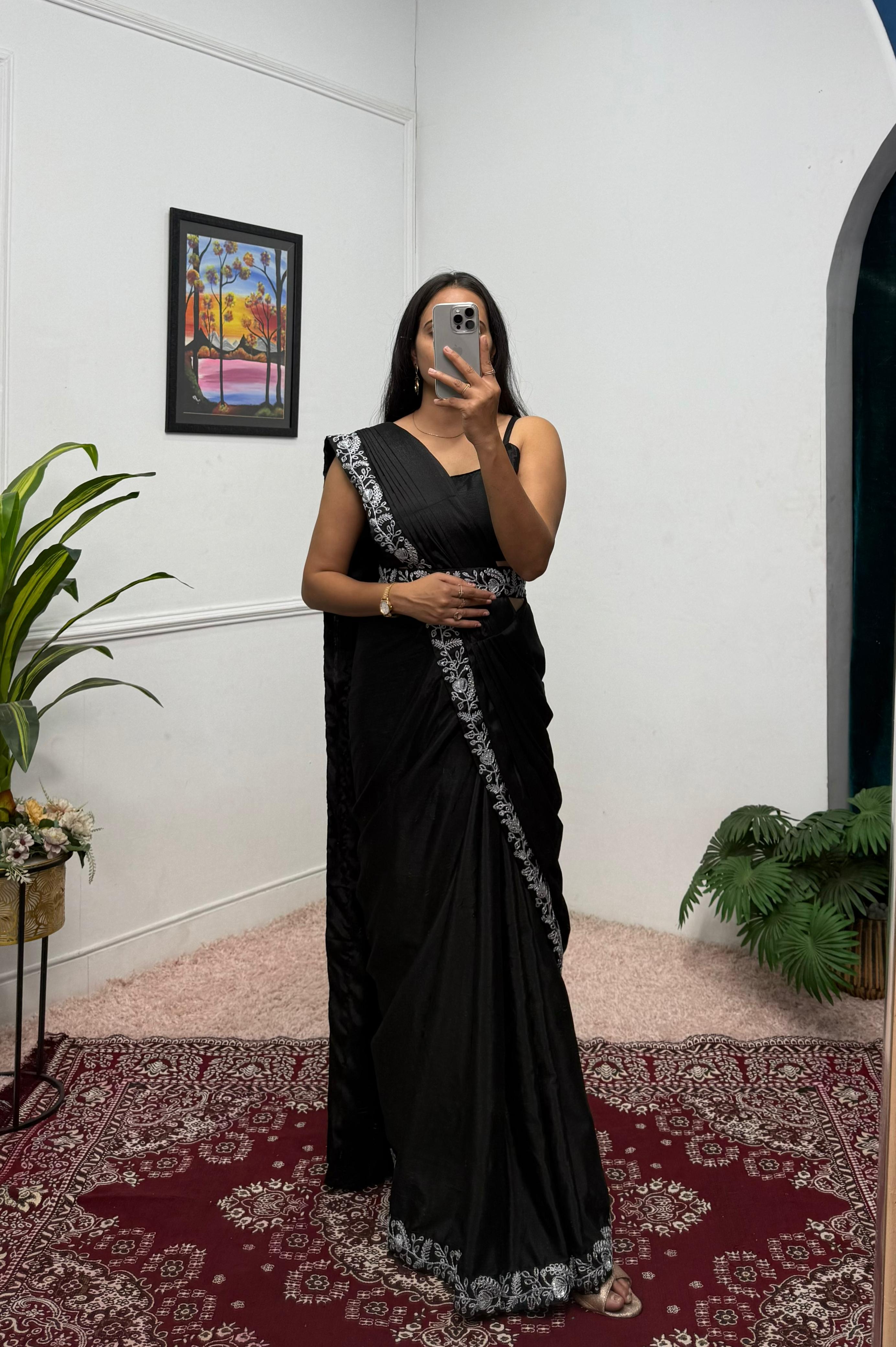 Fulari black party wear saree paired with a stylish jacket designed for a modern festive look for women