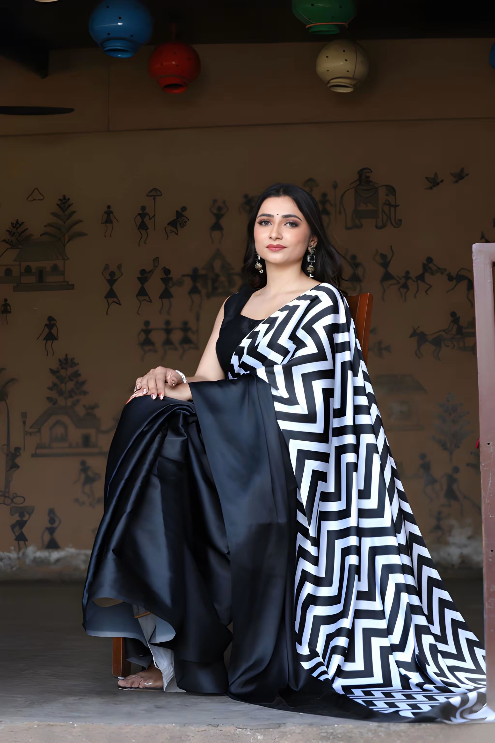 Fulari black satin saree accented with geometric white chevron detailing, perfect for cocktail and festive events