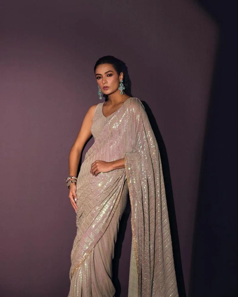 Fulari designer champagne evening saree featuring all-over sequin work and a sleek contemporary silhouette