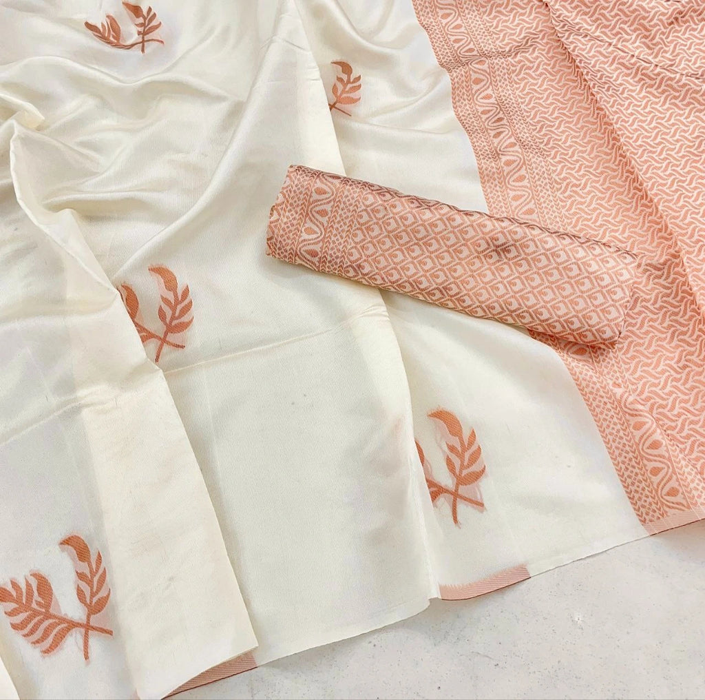 Elegant cream ethnic saree by Fulari featuring subtle motifs and a soft silk finish, ideal for traditional celebrations and events