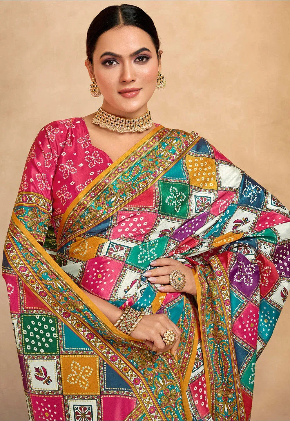 Festive multicolor printed saree by Fulari, featuring a soft crepe drape and a detailed traditional floral border.