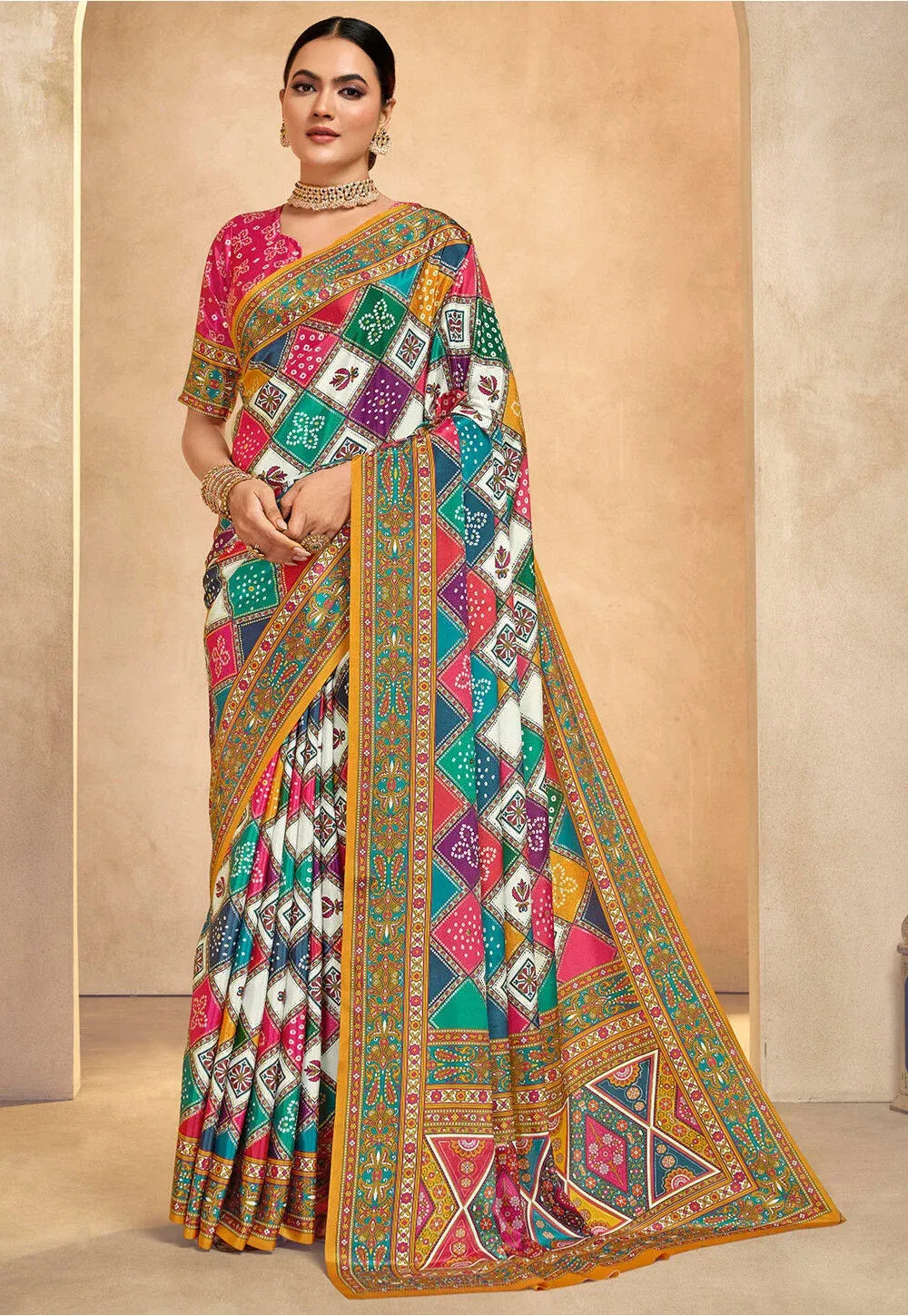 An elegant model showcasing the Fulari ethnic collection in a multicolor crepe saree with intricate geometric patterns.