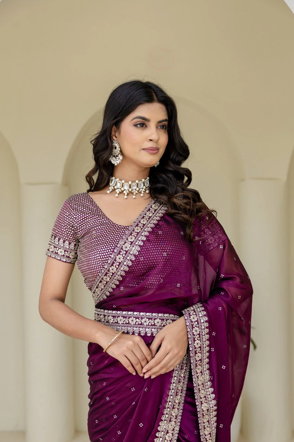 Fulari plum designer saree with fine embellishments curated for weddings and parties