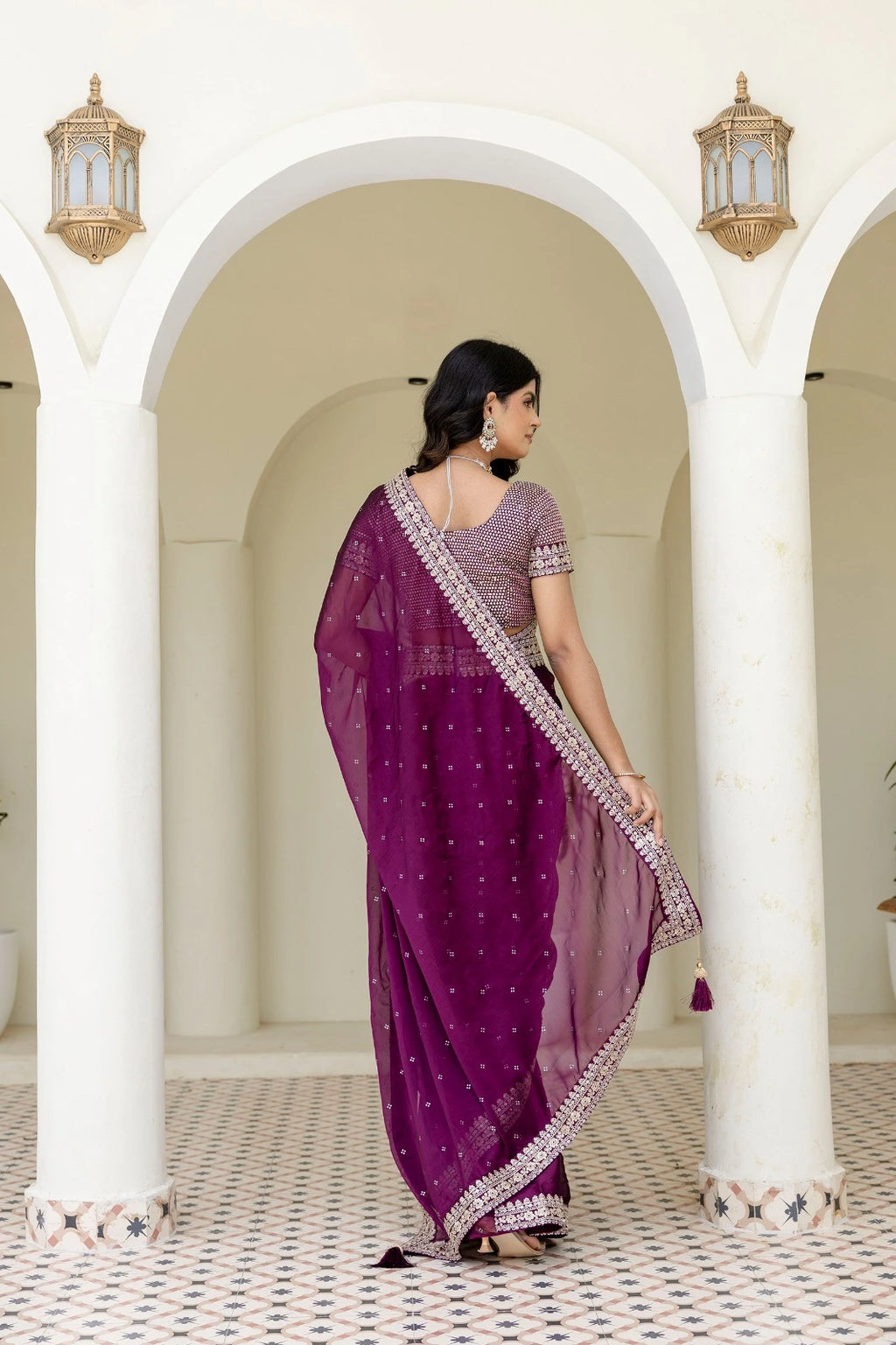 Fulari plum royal wedding saree with handcrafted border detailing and a designer embellished blouse for grand celebrations