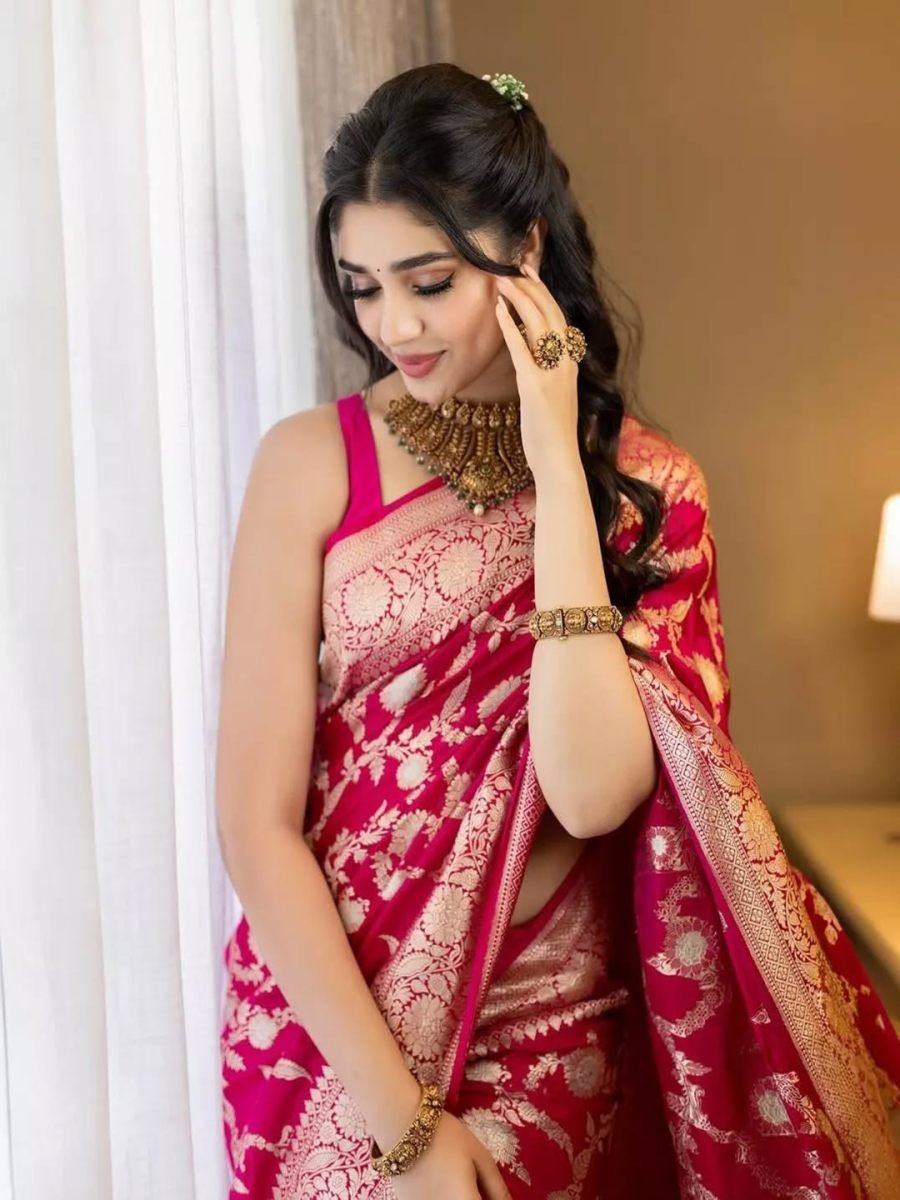 Fulari rani pink Banarasi saree with traditional zari motifs styled for wedding and festive wear