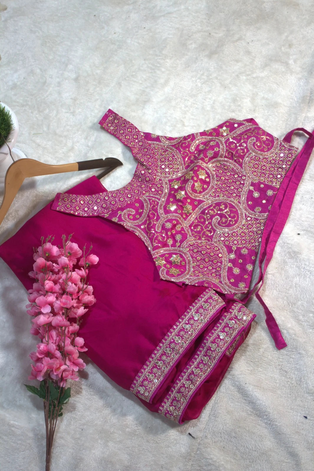 Rani pink traditional saree for festive and wedding wear from Fulari with elegant ethnic detailing