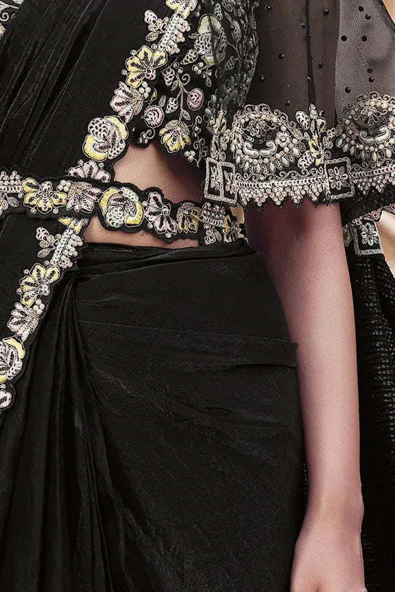 Black outfit with intricate silver and gold embroidery saree by fulari