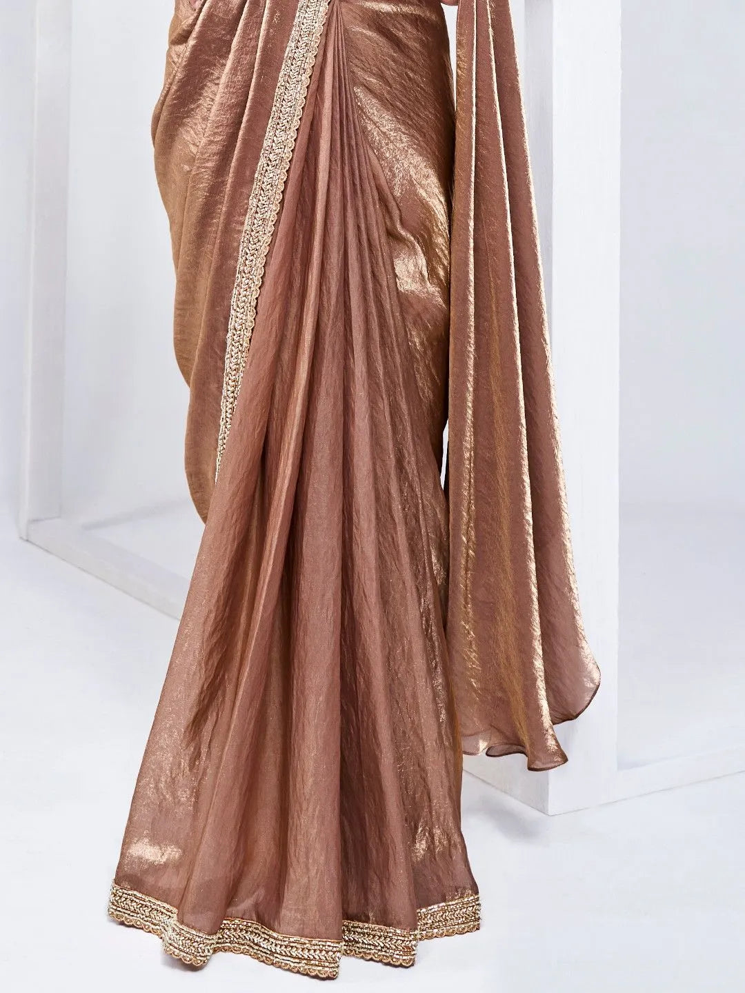 Bronze shimmer evening saree by Fulari with stylish stitched blouse