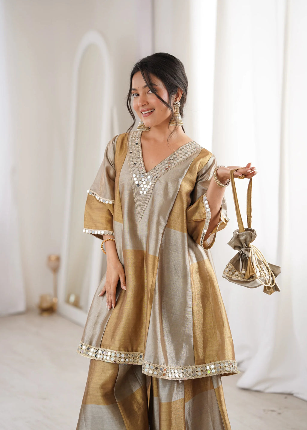 Festive gold palazzo outfit by Fulari featuring mirror embellishments and modern ethnic style