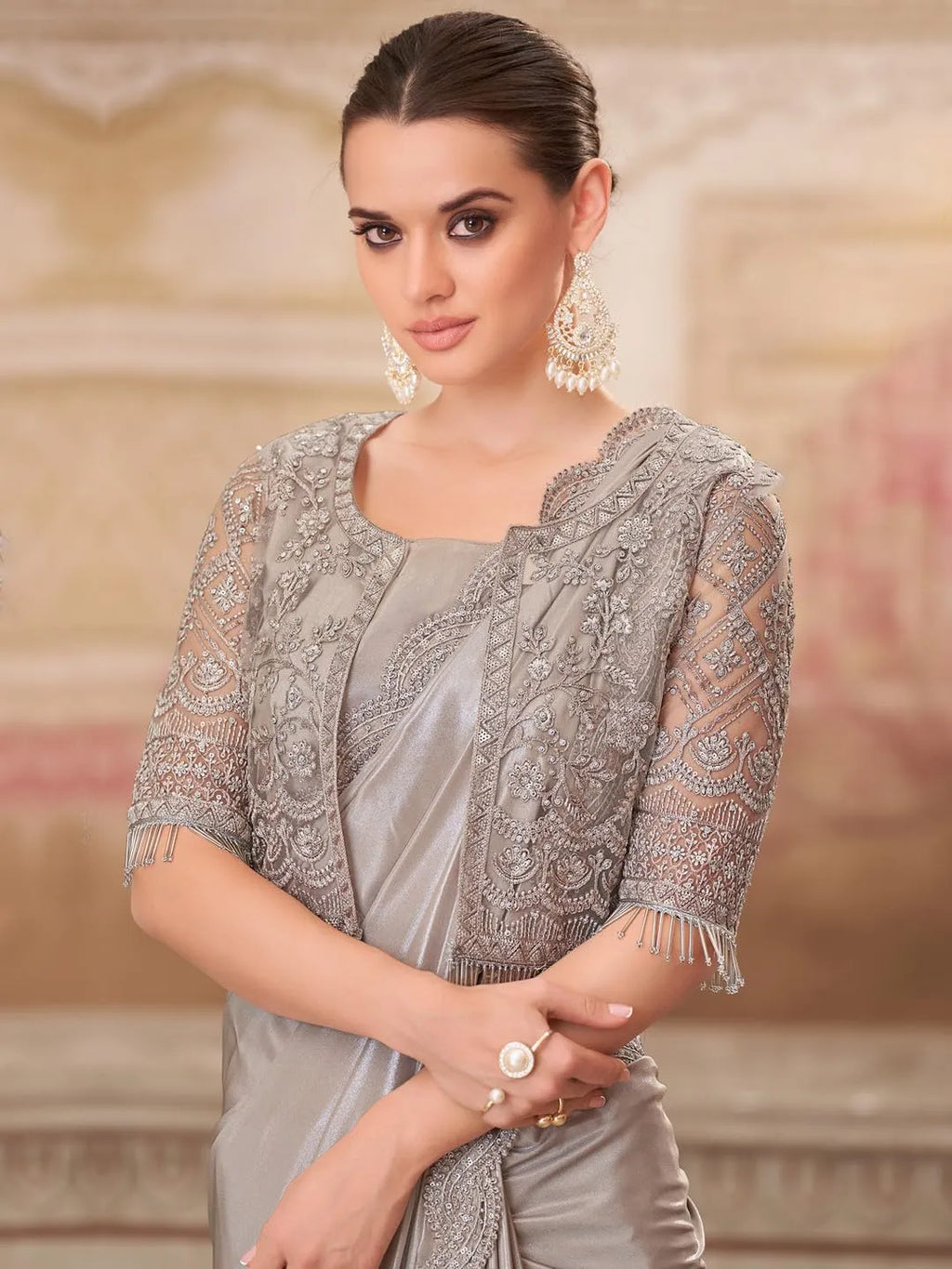 Grey embroidered reception saree by Fulari with detailed jacket style blouse
