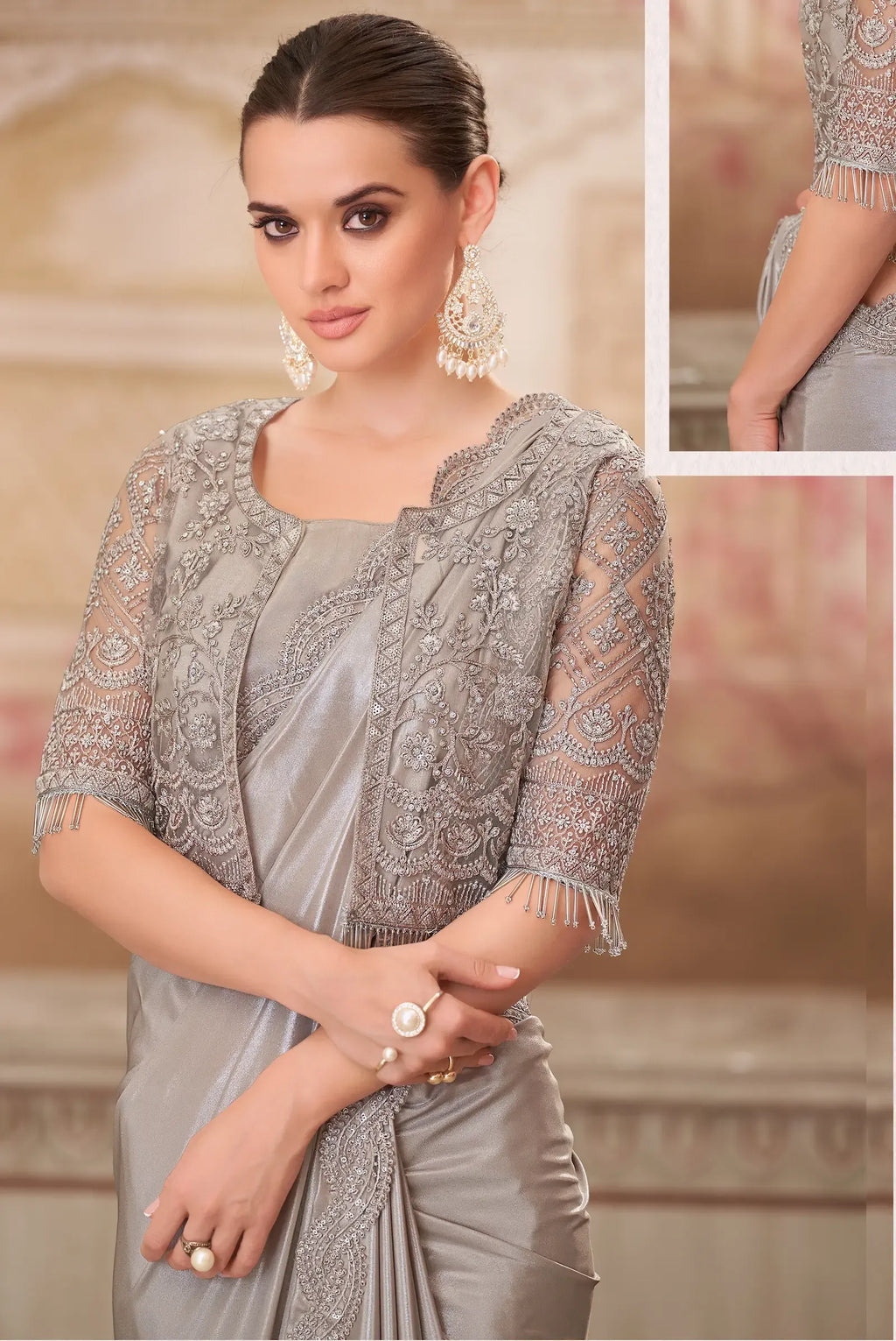 Grey wedding guest saree by Fulari featuring refined embroidery and soft satin drape