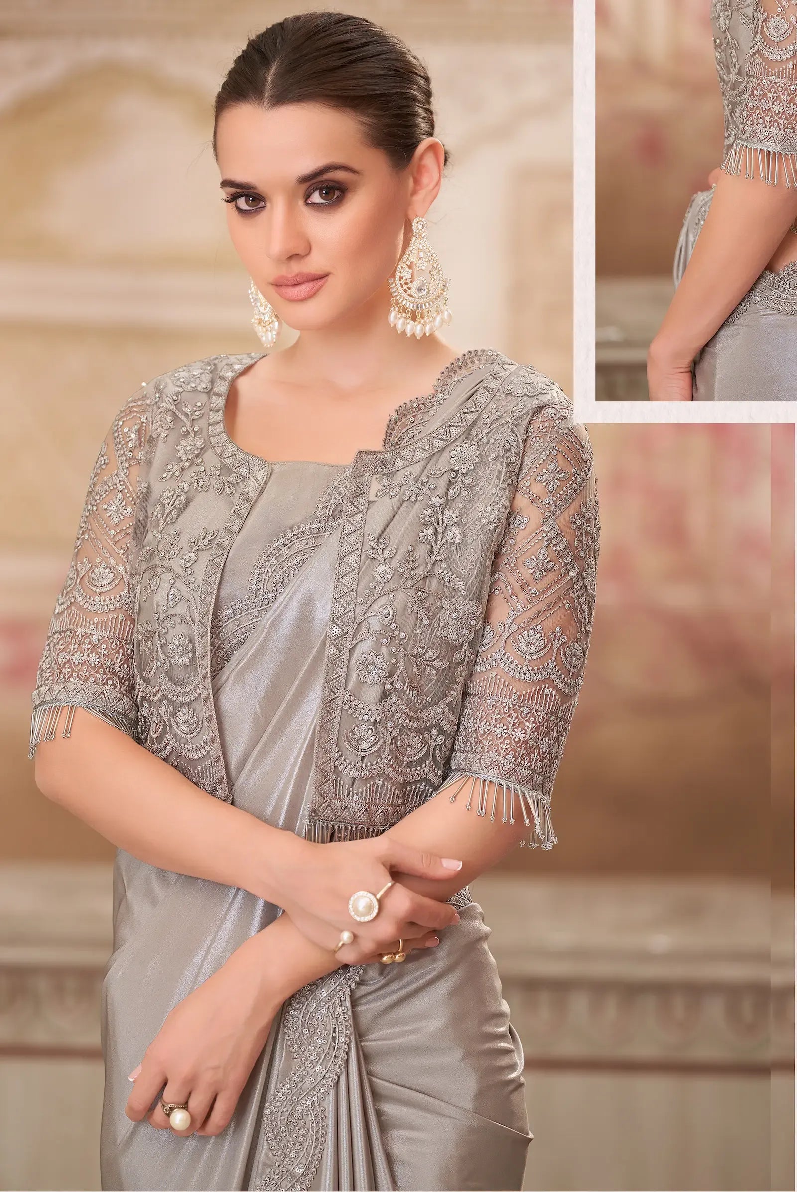 Grey wedding guest saree by Fulari featuring refined embroidery and soft satin drape