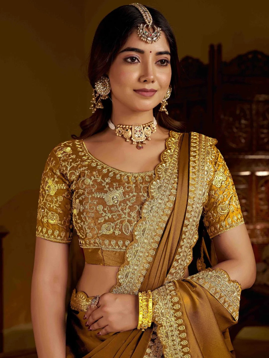 Luxury mustard silk saree by Fulari with ornate border and premium look