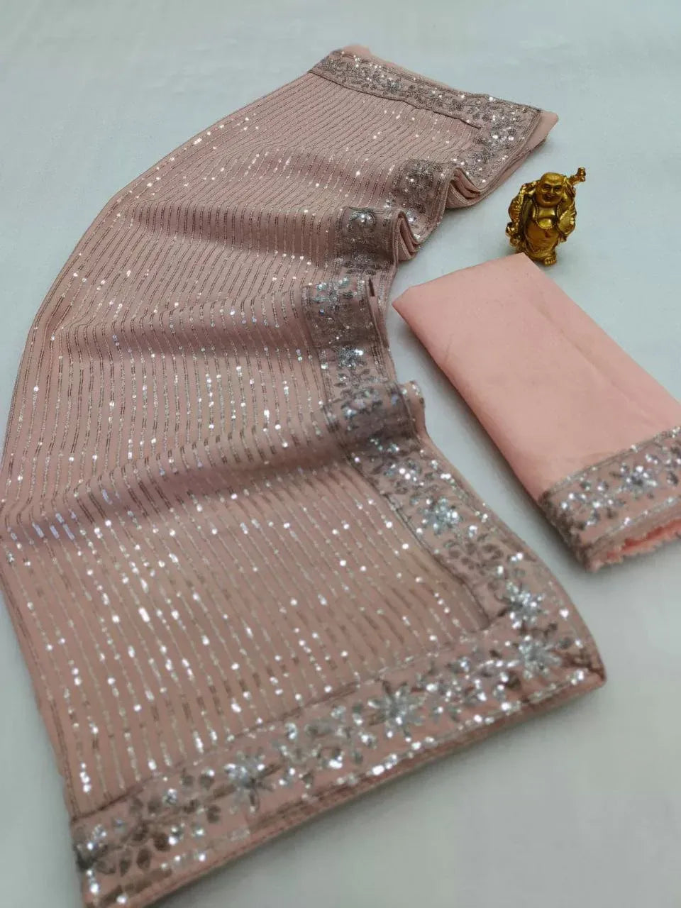 Peach designer evening saree by Fulari with all over sequin work