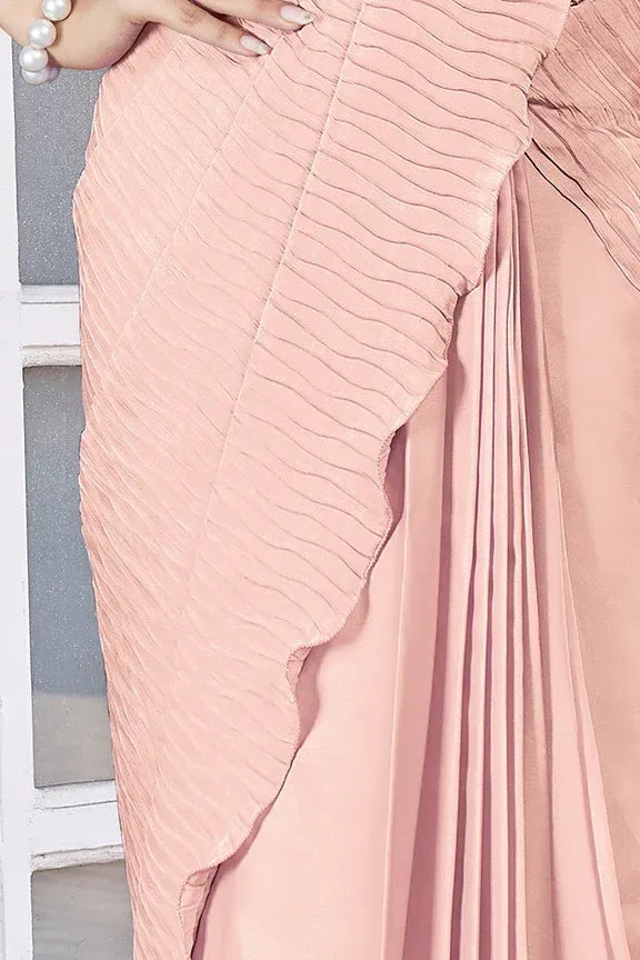 Peach designer festive saree by Fulari with embroidered blouse and belt