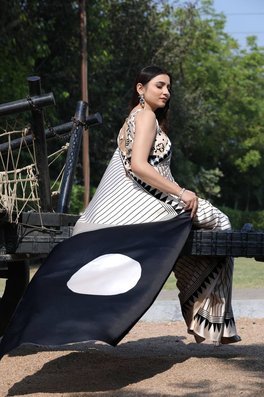 Fulari black satin saree with elegant sheen for a chic Bollywood-inspired party look