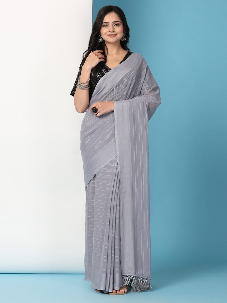 Woman wearing a gray saree