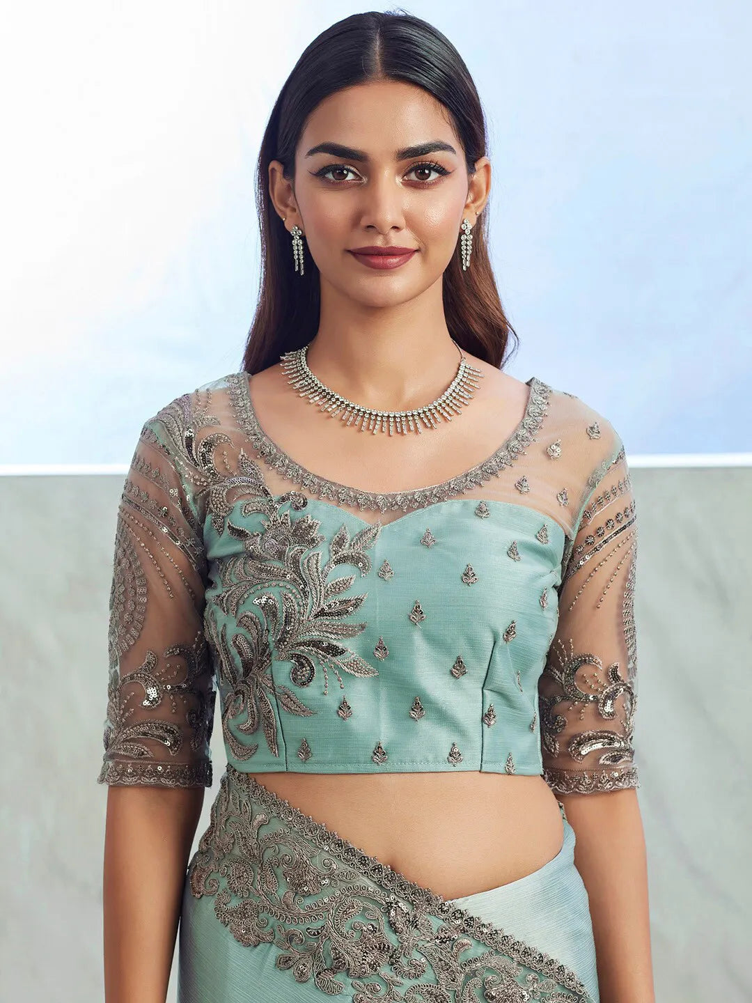 Fulari Premium sea green saree paired with beautifully embroidered blouse for elegant look