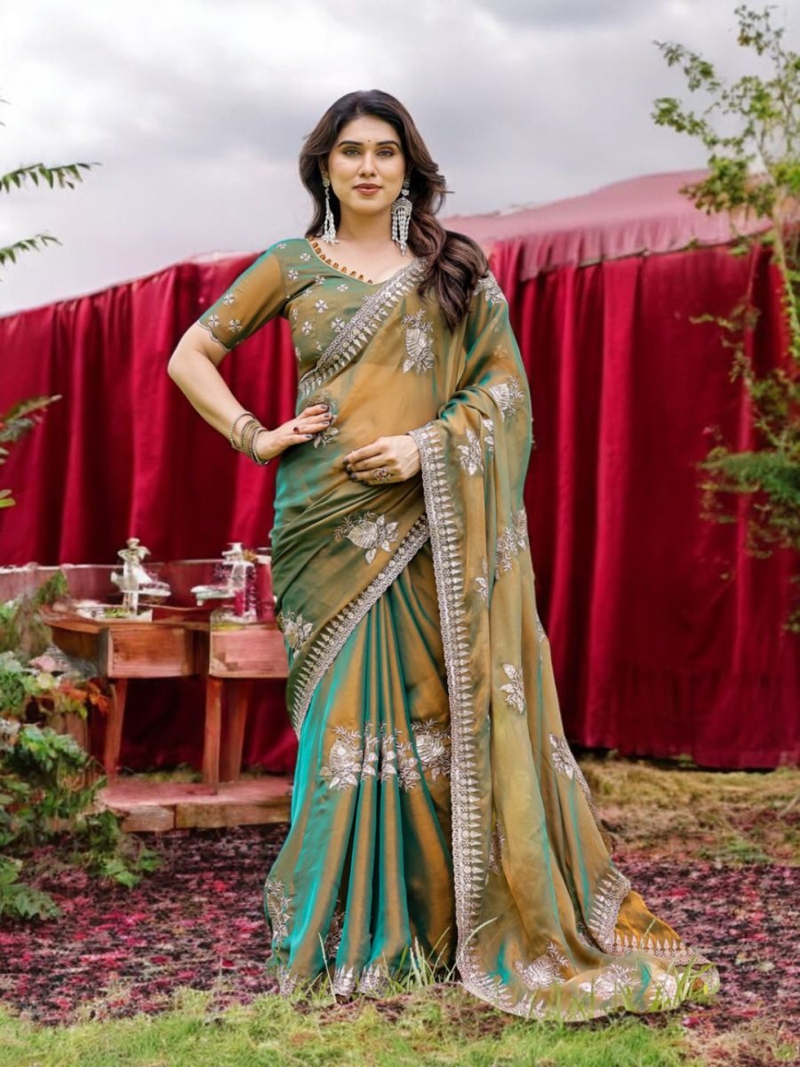 Woman in a green saree